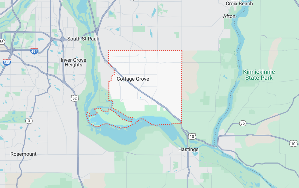 Tow truck assisting a stranded vehicle in Cottage Grove, MN.